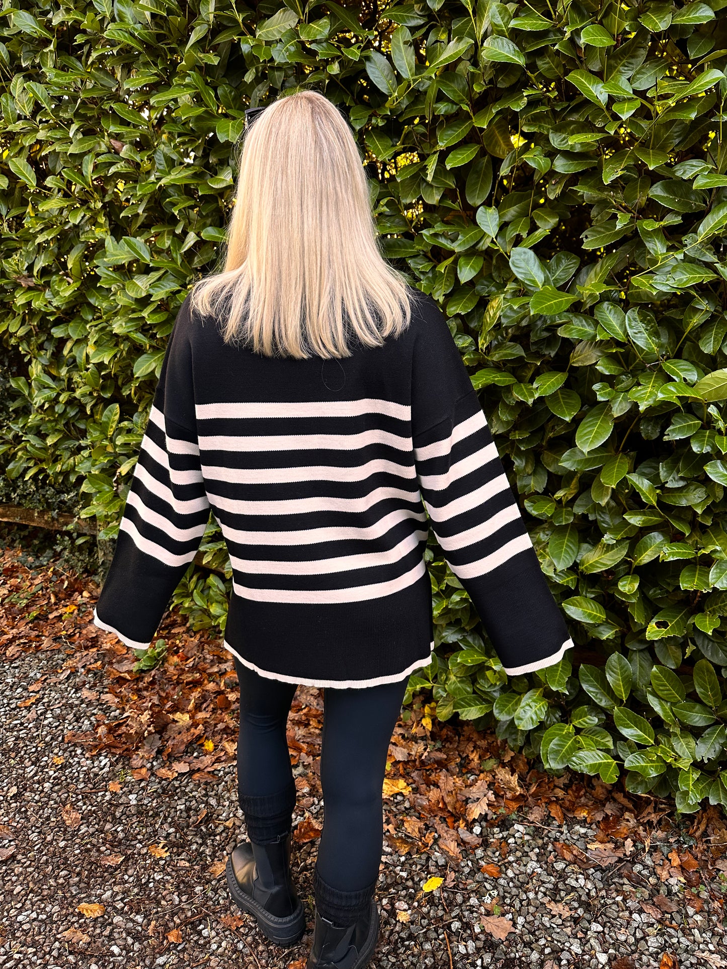 Women's Black and White Striped Turtleneck Sweater