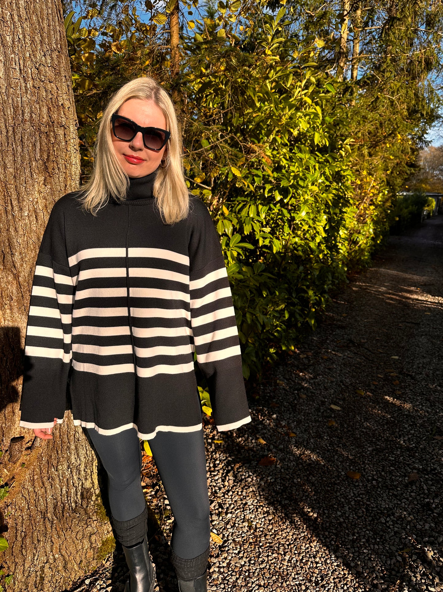 Women's Black and White Striped Turtleneck Sweater